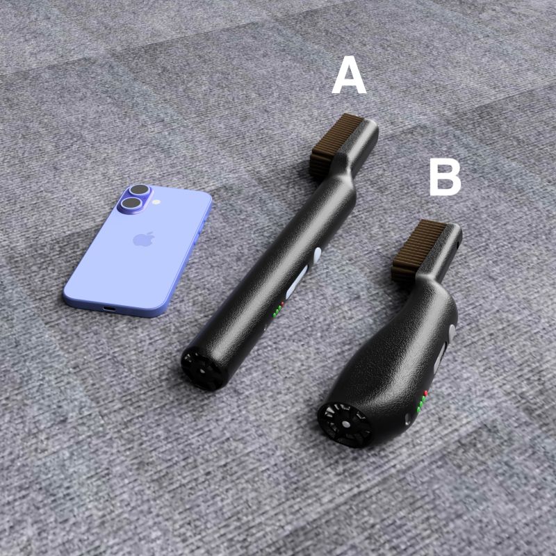 Two black ChalkBlaster prototype designs labelled A and B, shown next to a smartphone for scale on grey carpet.