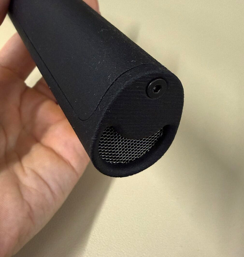 Close-up of the ChalkBlaster V2 handle end showing the crescent-shaped air intake covered by a fine hexagonal stainless steel mesh
